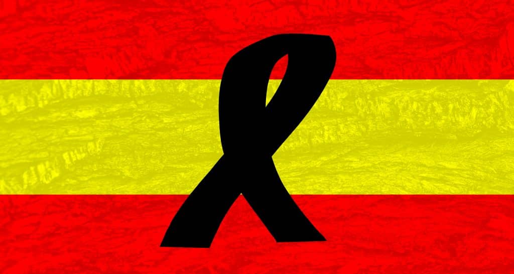 bandera-de-espana-crespon-negro-1024×546-1